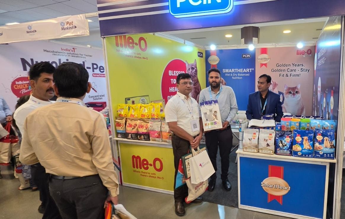 Pet nutrition exhibition booth showcasing Me-O and SmartHeart cat food products at WSAVA PCIN conference